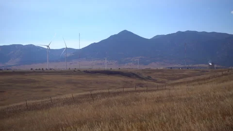 Wind Turbines (Windmill power or windy energy)  isn't working in yellow field Stock-Footage 146917198