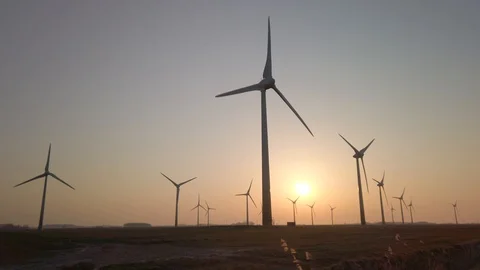 Wind turbines in windpark at sundown Video stock 128227901