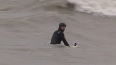 Wind waves and surfer at Toronto eastern beaches in wind storm Stock Footage 37799082