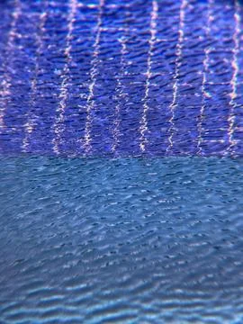 Wind waves in pool water Stock Photos