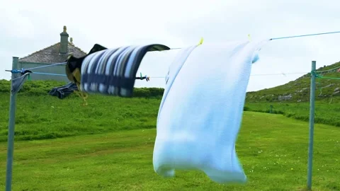 Wind Waves the Towels on the Laundry Line, Slow Motion, LOOP Stock Footage 156303365