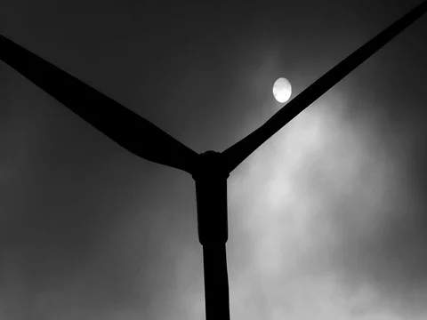 Wind wheel and full moon with mysterious dark clouds Stock Footage 80989255