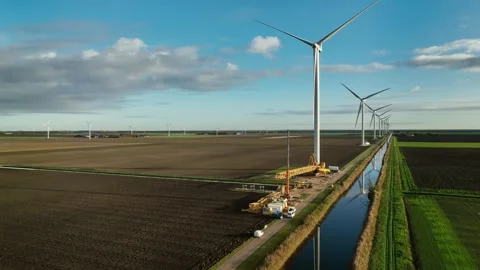 Windfarm construction in the Netherlands Stock Footage 289956342