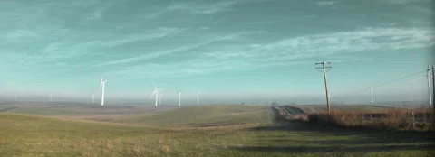 Windfarm on a hazy day Stock Footage 261583361
