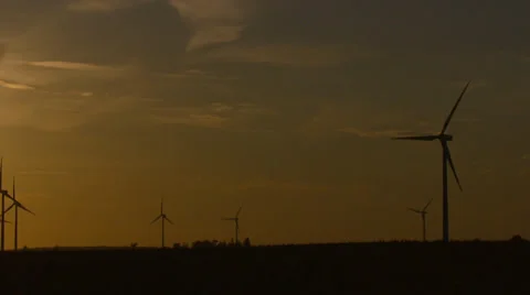 Windfarm at Sunset with Pan Stock Footage 32935810