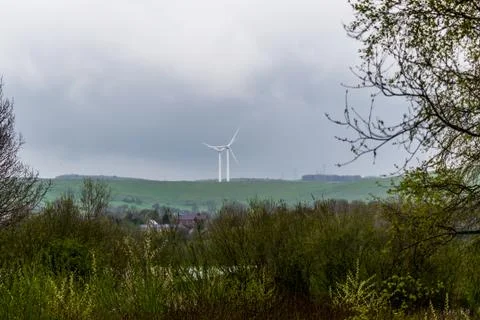 Windfarm Through The Trees Stock Photos