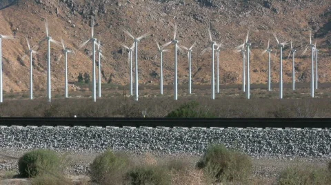 Windfarm zoom into bases Stock Footage 699784
