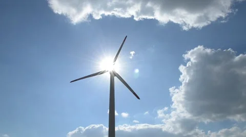 Windgenerator  with rays from light Stock Footage 42309856
