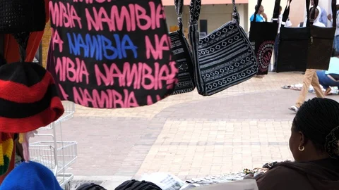 Windhoek stall, walking people, Namibia bag, Africa in 4K Stock Footage 90780450