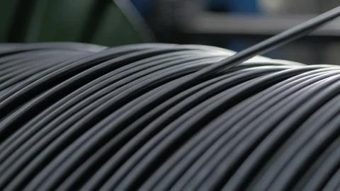 Winding cable on a rotating coil. Production of electric cable. Stock-Footage 125380007