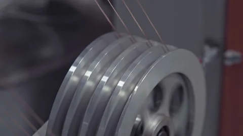 Winding cable on a rotating coil. Production of electric cable. Stock Footage 141306127