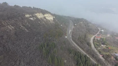 Winding Forest Road Through Misty Hills Aerial View Stock Footage 328825960