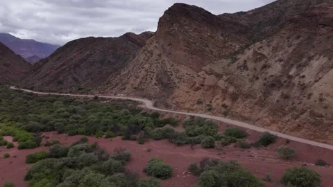 Winding Highway Through Red Rock Canyons from Cafayate to Salta, Argentina Stock Footage 343671263