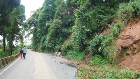 Winding Hill Road Through Dense Forest of Darjeeling, India on 10th July 2025 Stock Footage 327110840