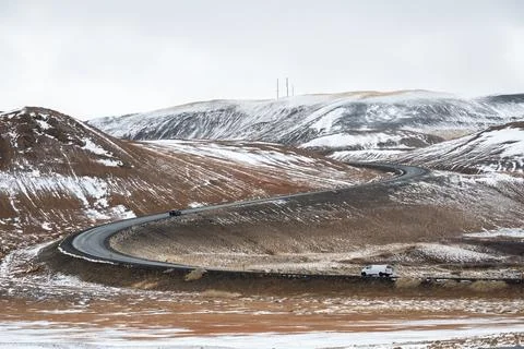 Winding mountain pass ring road . iceland icelandic landscape frozen land Stock Photos