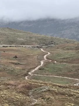 Winding mountain path Stock Photos