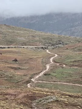 Winding mountain path Stock Photos