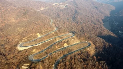 Winding Mountain Road Aerial Drone View with Curves and Forest Landscape Stock Footage 326707053