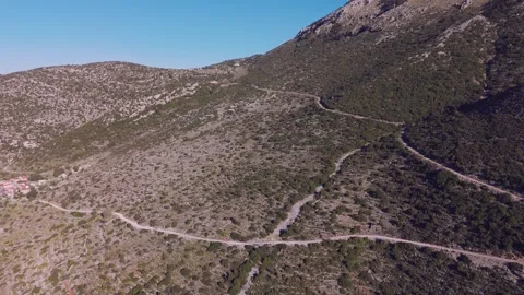 Winding Mountain Road and Hillside Village in Peloponnese, Greece Stock Footage 337864581