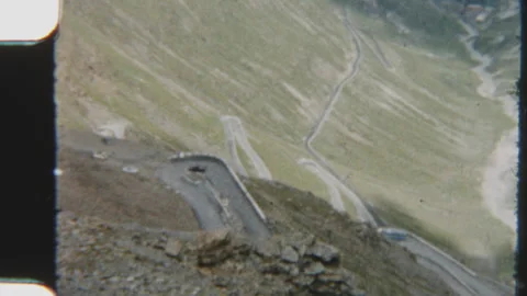 Winding Mountain Road Carving Through Lush Green Slopes Stock Footage 322132319