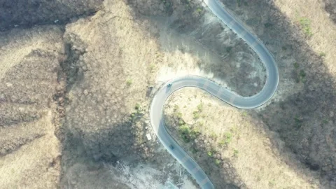 Winding mountain road landscape rotating shot Stock Footage 179370251