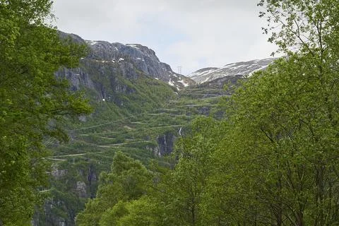 Winding mountain road with many switchbacks and hairpins. Stock Photos