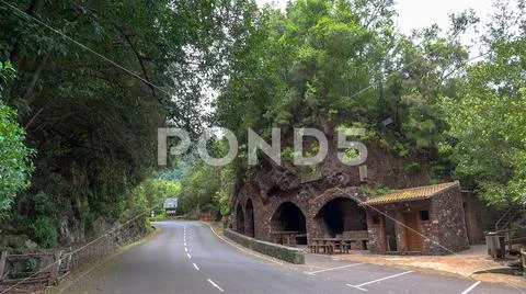Winding mountain road resting place and green forest in La Palma island in Spain Stock Photos