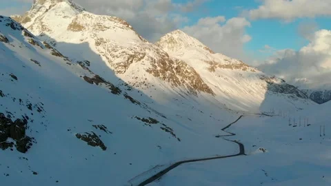 Winding Mountain Road Through Alpine Winter Landscape Stock Footage 341608075