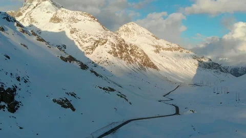 Winding Mountain Road Through Alpine Snow Stock Footage 341608297