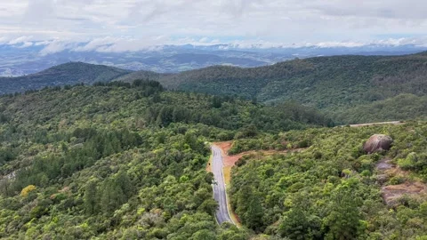 Winding Mountain Road Through Forested Hills 库存影片 345262375