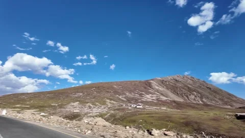 Winding Mountain Road Trip Immersed in Nature's Beauty - Scenic Asphalt Driv Stock Footage 286416650
