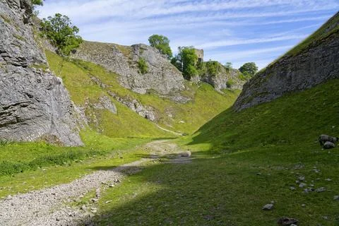 Winding path down through Cave Dale. Stock Photos