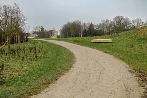 Winding Path Through a Grassy Park Stock Photos