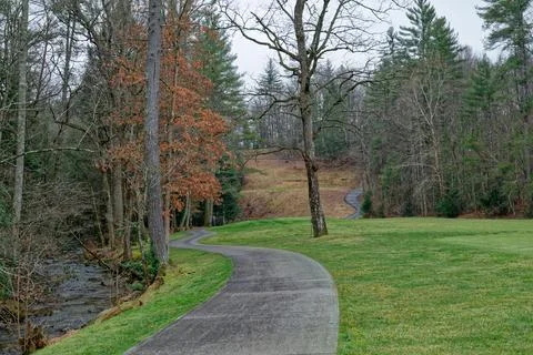 Winding path through the park Stock Photos