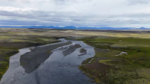 Winding River Flowing Through Icelandic Plains Stock Footage 324047330