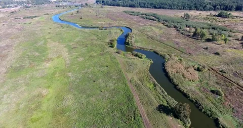 Winding river from a height, a river in a field Stock Footage 97001286