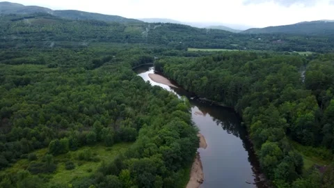 Winding River Surrounded By Mountains Stock Footage 306805667