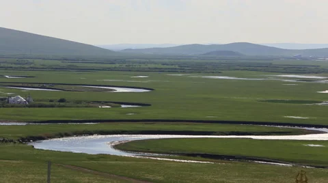 A winding river through the grasslands Stock Footage 40490169