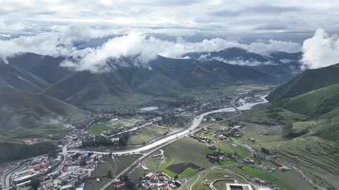 Winding River Through Mountain Town in Sichuan, China Stock Footage 344035041