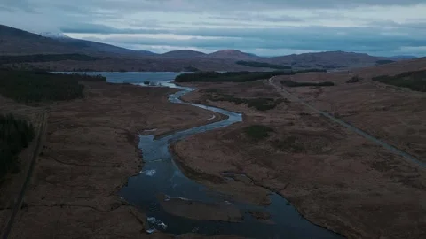 Winding river through mountains in the Scottish Highlands Stock-Footage 331171571