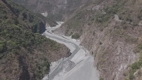 Winding River Through Remote Mountain Valley Stock Footage 331572584