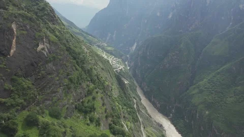 Winding River Through Steep Green Gorge Tiger Leaping Gorge China Stock Footage 336007121
