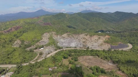 Winding Road Below a Quarry Hillside in Puerto Princesa Palawan Video stock 347182707