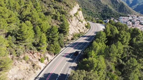 Winding Road Between Mountains. Car Is Driving On Road. Video stock 274960503
