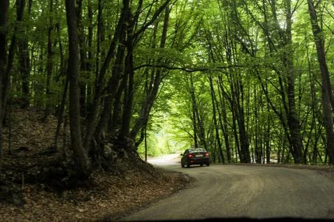 Winding road down. 库存照片