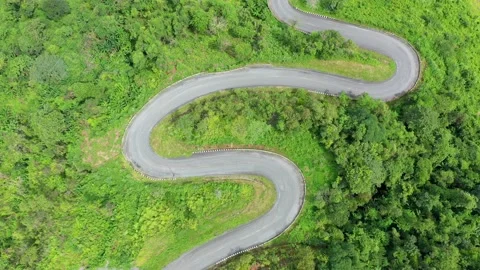 Winding road in the forest The top view of the beautiful Aerial view of asphalt  스톡 동영상 142300417