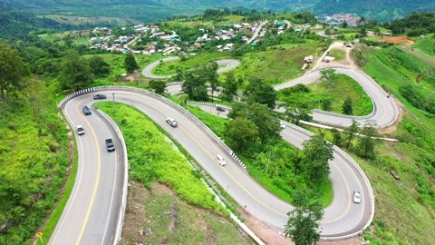 Winding road in the forest The top view of the beautiful Aerial view of road Stock Footage 147132059