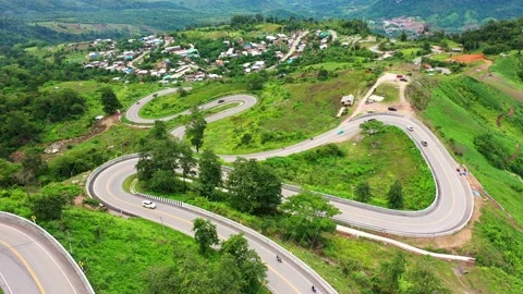 Winding road in the forest The top view of the beautiful Aerial view of road Stock Footage 147132068