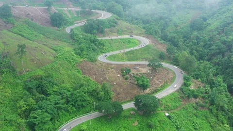 Winding road in the forest The top view of the beautiful Aerial view of asphalt  Stock Footage 149495304