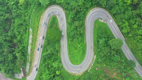 Winding road in the forest The top view of the beautiful Aerial view of asphalt  스톡 동영상 149497553